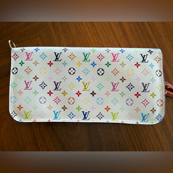 Louis Vuitton Handbags - Louis Vuitton
Multicolor Insolite
Wallet - Very Good
Condition
